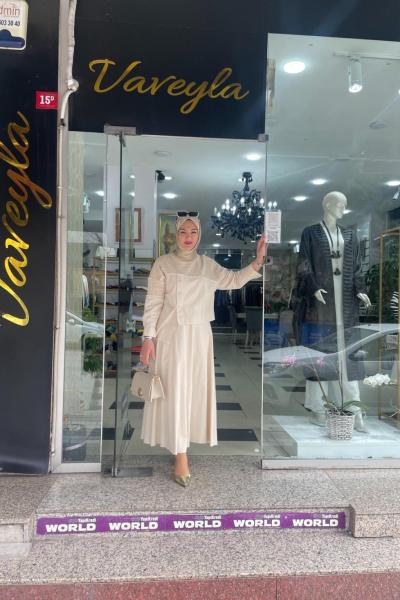 Eteklı takım ön dugmelı Ekru